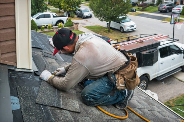 Professional Flat Roof Repair technician working in Mount Morris, MI